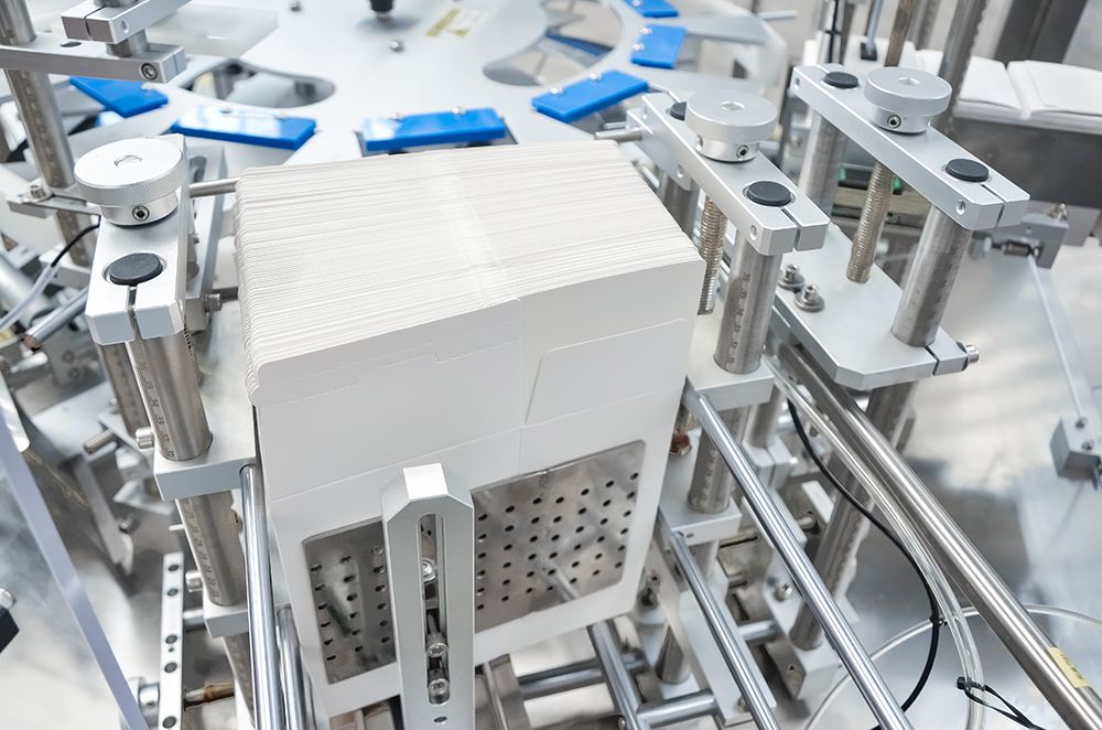 3.-Cardboard-leaflet-feeding 3.-تغذية النشرات بالكرتون